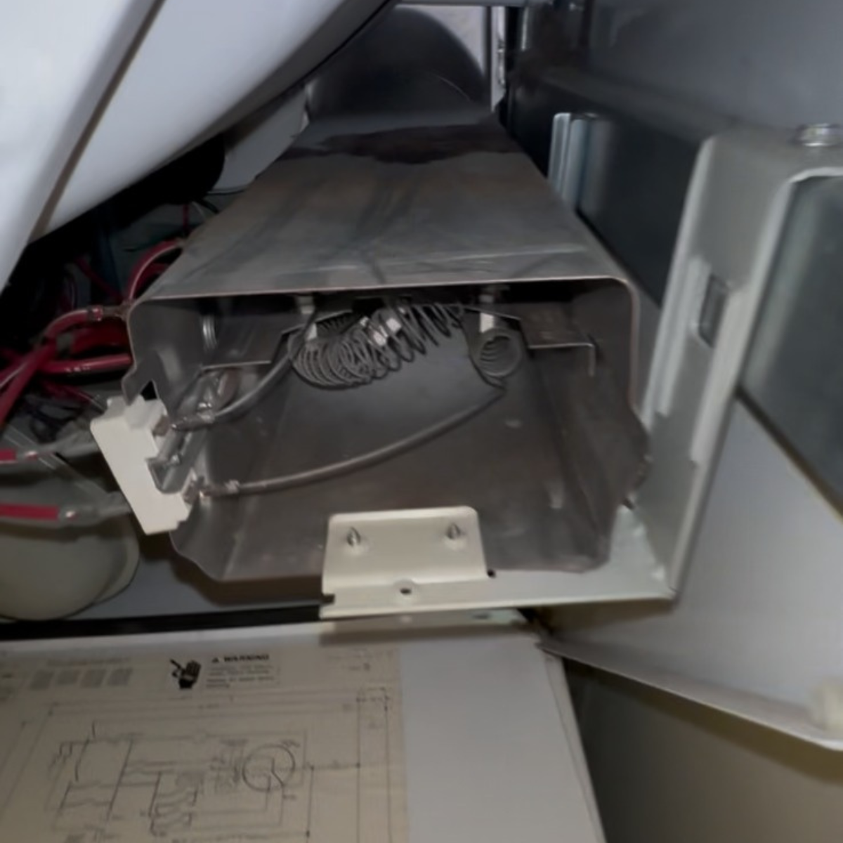 Interior view of a dryer vent showing accumulated lint and debris, emphasizing the importance of professional dryer vent cleaning for fire prevention and improved air quality.