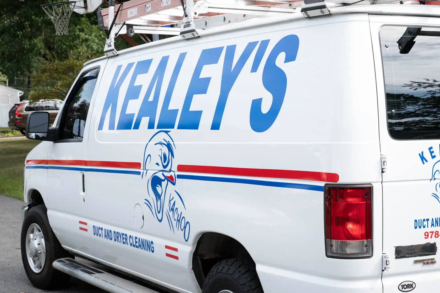 Kealey's Duct and Dryer Cleaning van servicing coastal properties and Hampton dryer vents.
